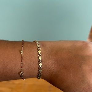 14k yellow gold heart bracelet.